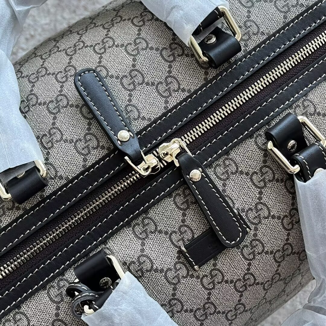 G*u*i Keepall Bag
