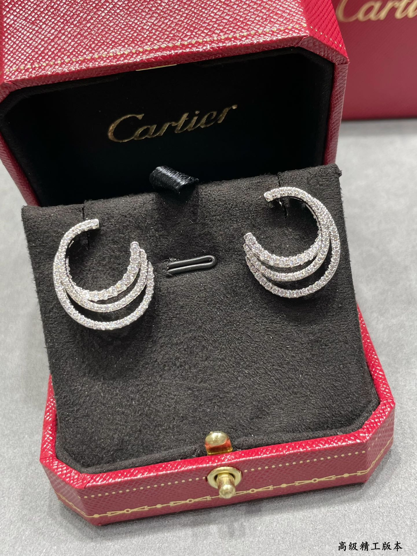 Ca*t*er three-circle full diamond earrings