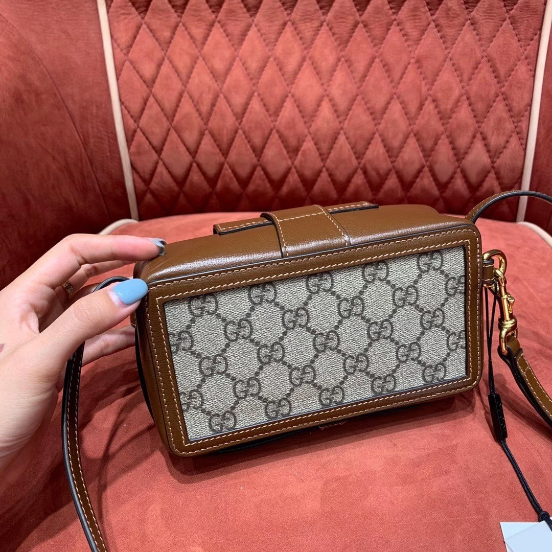 G*u*i GG mini bag with clasp closure