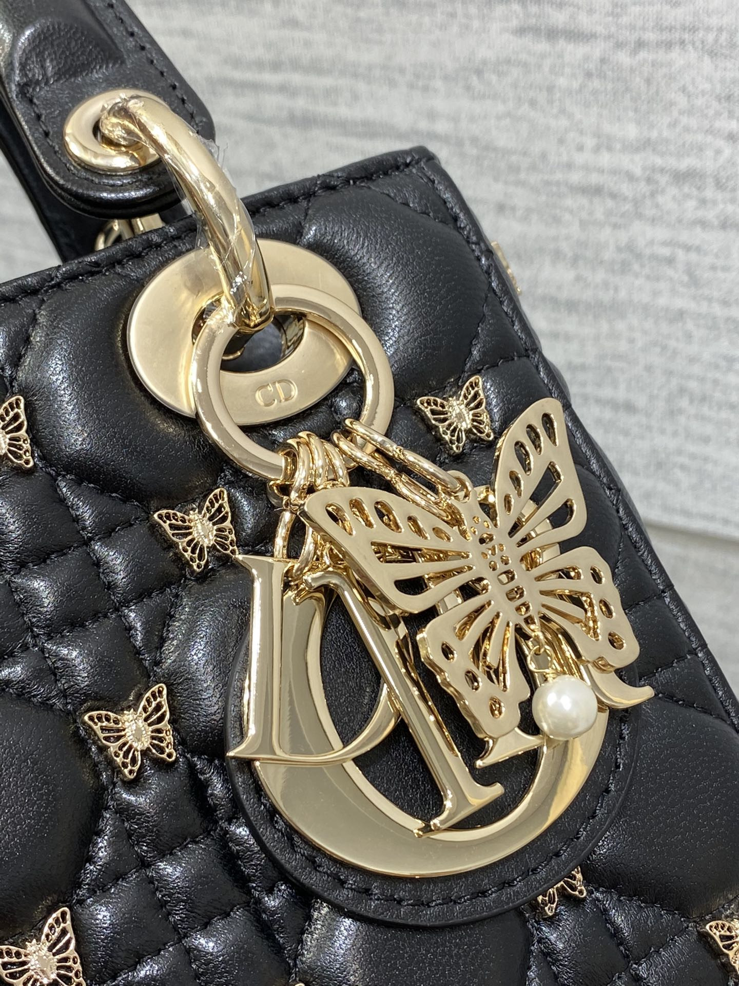 SMALL LADY D*0r Black with Butterfly Studs