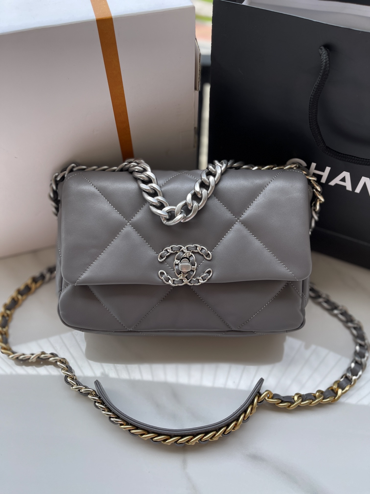 Ch*el 19 HANDBAG Shiny Leather, Gold-Tone, Silver-Tone & Ruthenium-Finish Metal Dark Gray 6.2 × 10.1 × 3.5 in