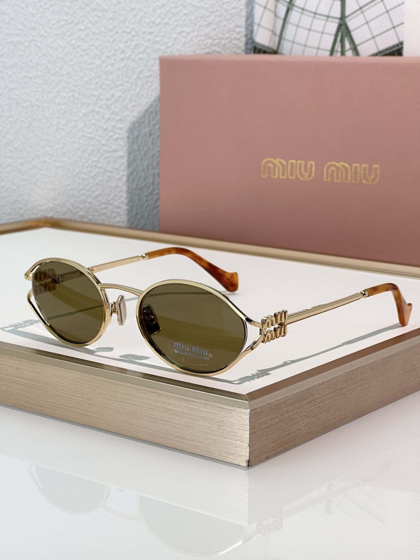 Miu Miu Glasses SMU52Y 54-21-125